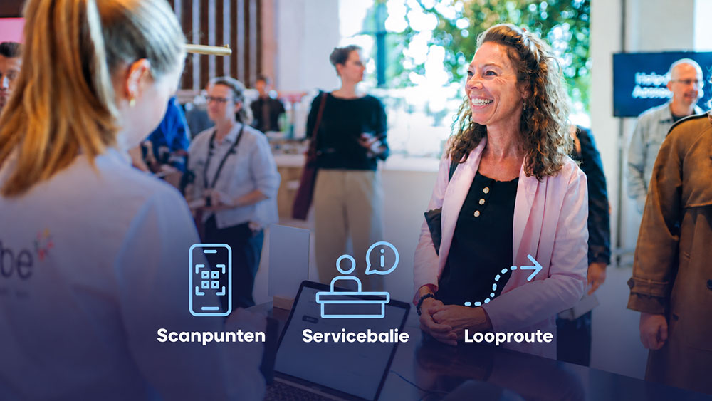 deelnemer bij de registratiebalie