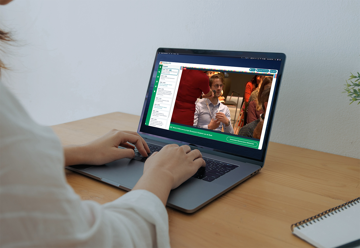 participant watching a conference livestream from home